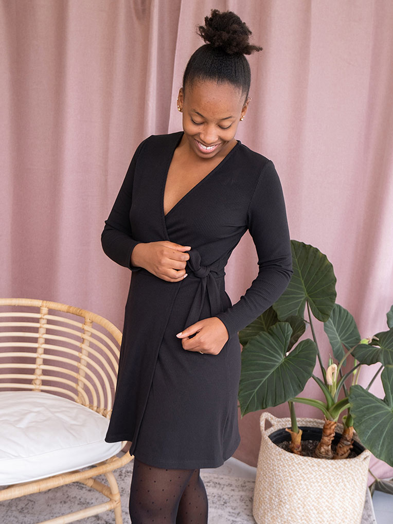 Women's black knit wrap dress